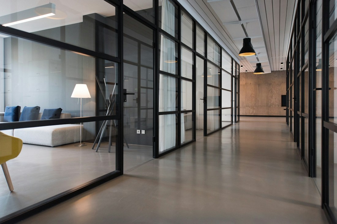 Bright contemporary workspace with natural materials and greenery